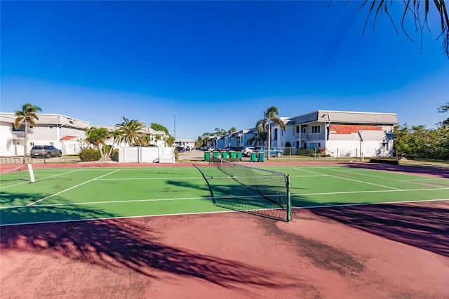 view of sport court featuring basketball hoop