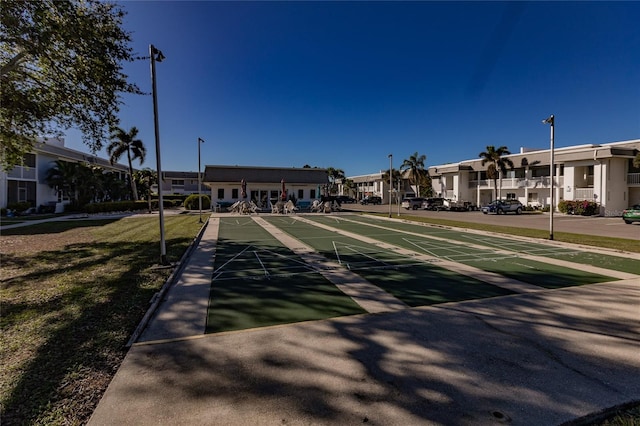 view of community featuring a lawn