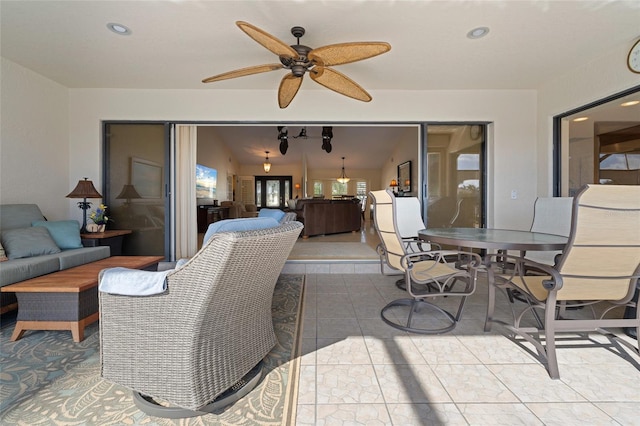 view of patio with ceiling fan and an outdoor hangout area