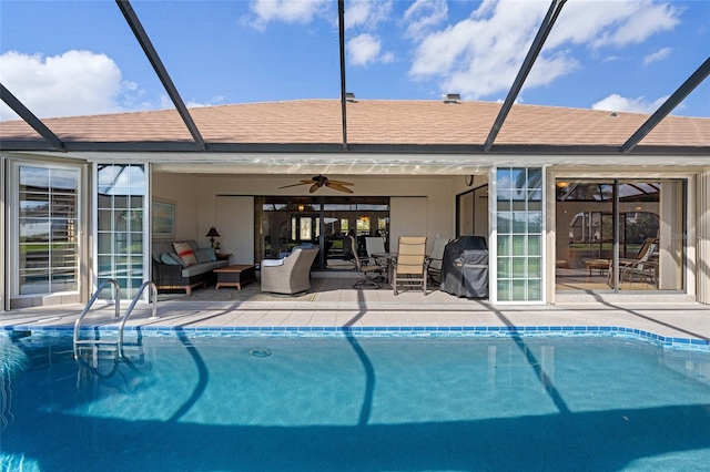 view of pool with ceiling fan, area for grilling, a patio area, and an outdoor hangout area