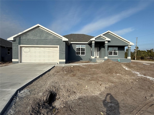 view of front of property with a garage