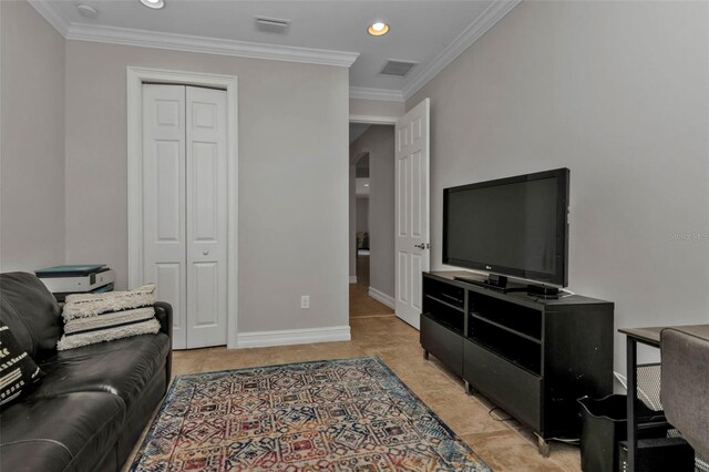 living room with ornamental molding