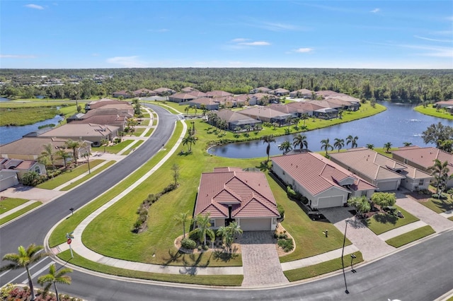 drone / aerial view with a water view