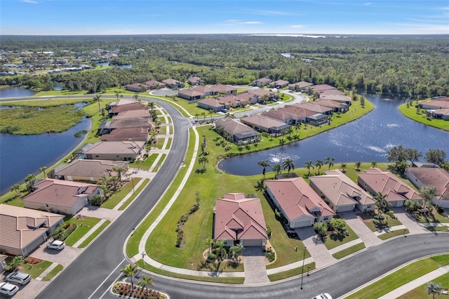 bird's eye view with a water view