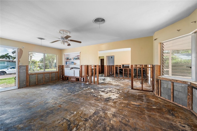 interior space featuring ceiling fan