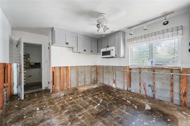 kitchen featuring ceiling fan, gray cabinetry, and rail lighting