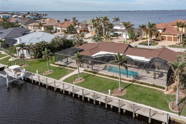 drone / aerial view with a water view