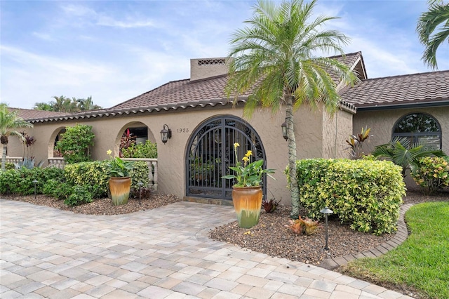 view of mediterranean / spanish house