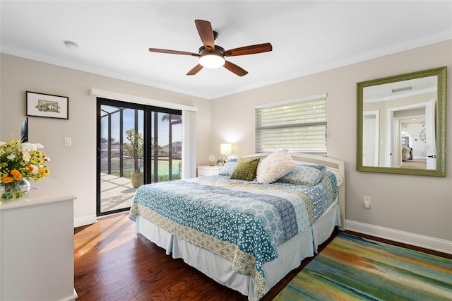 bedroom with access to outside, multiple windows, ceiling fan, and dark hardwood / wood-style flooring