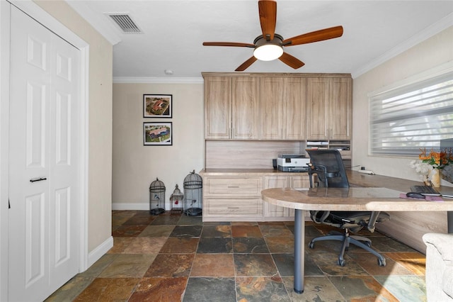 home office featuring crown molding, ceiling fan, and built in desk