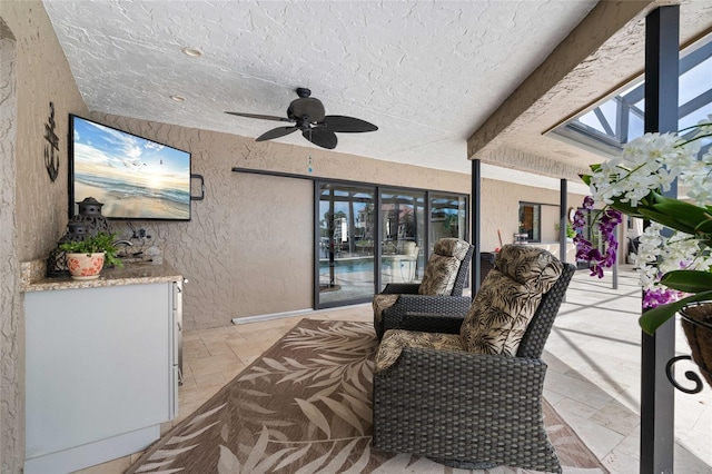 view of patio / terrace featuring ceiling fan