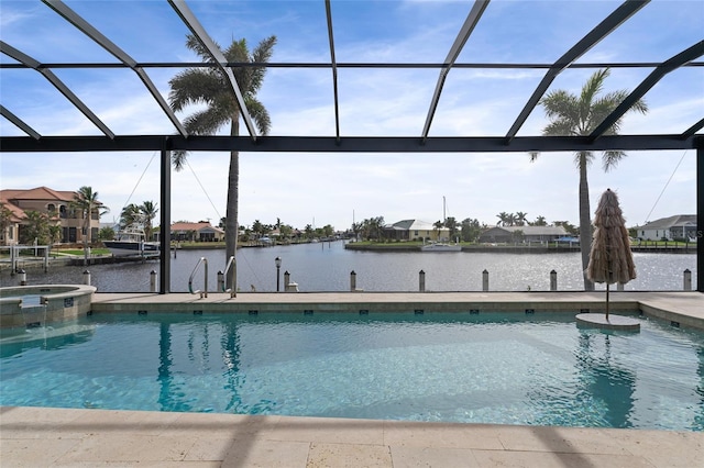 view of swimming pool with a lanai, an in ground hot tub, a dock, and a water view