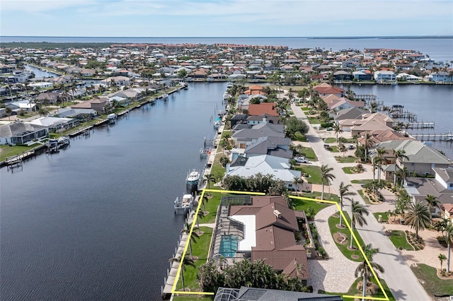 birds eye view of property featuring a water view