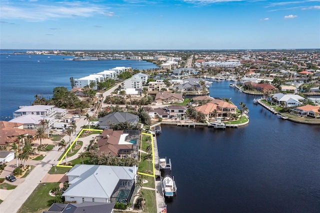 drone / aerial view featuring a water view