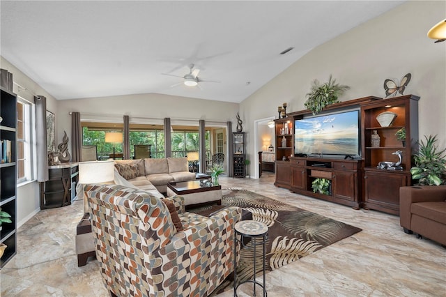 living room featuring ceiling fan and vaulted ceiling