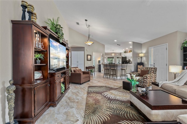 living room with vaulted ceiling