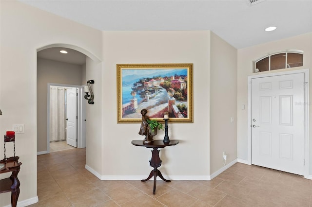 view of tiled foyer entrance