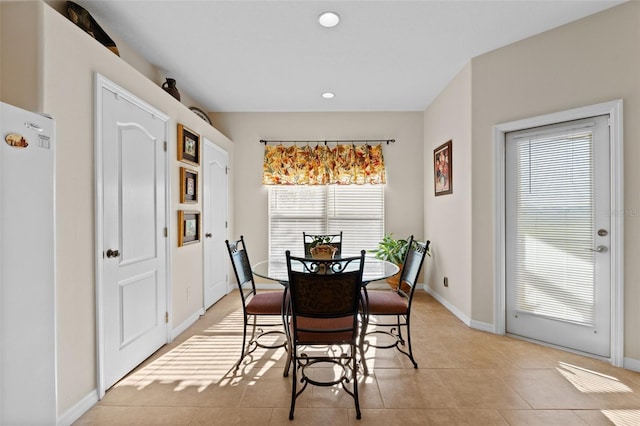 view of tiled dining space