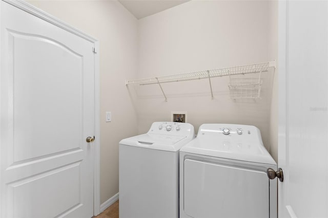 laundry area featuring separate washer and dryer