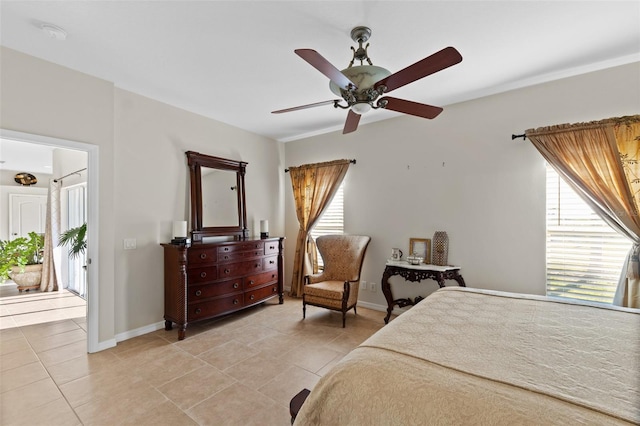 bedroom featuring ceiling fan and light tile patterned flooring