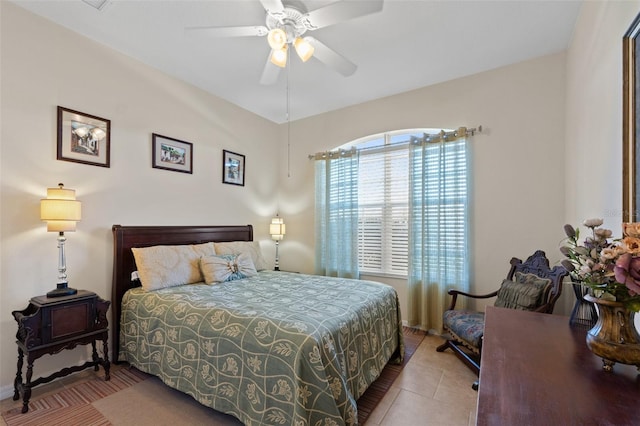 bedroom featuring ceiling fan and light tile patterned floors