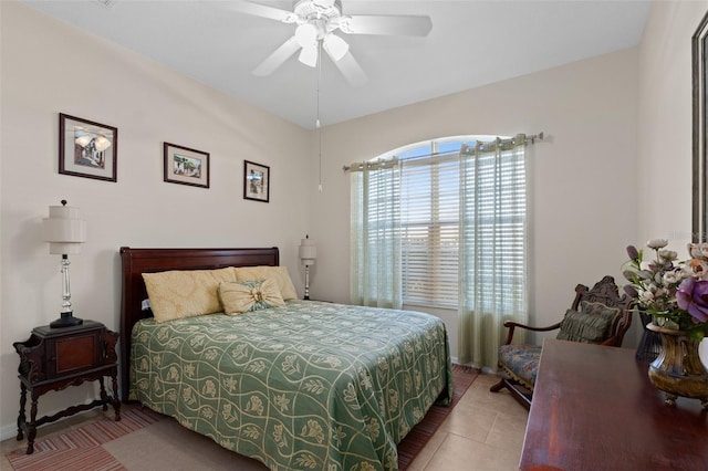 bedroom featuring ceiling fan and light tile patterned flooring