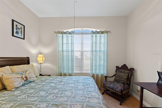 bedroom featuring tile patterned floors