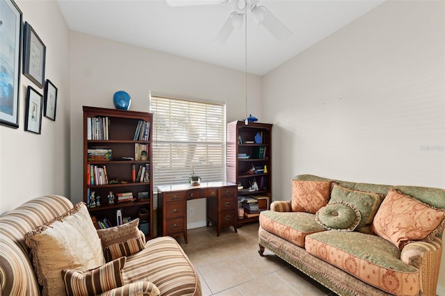 tiled living room featuring ceiling fan