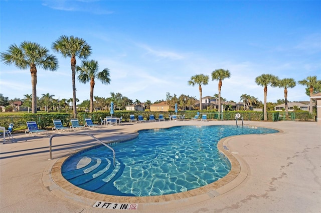 view of swimming pool featuring a patio