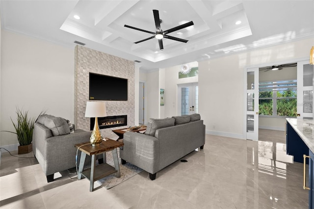 living room with a fireplace, french doors, ornamental molding, and coffered ceiling