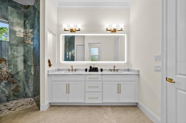 bathroom with vanity, crown molding, and walk in shower