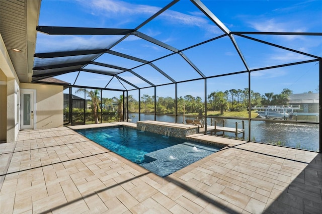 view of swimming pool featuring an in ground hot tub, a lanai, pool water feature, a water view, and a patio