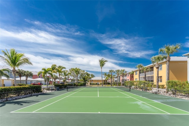 view of sport court with basketball hoop