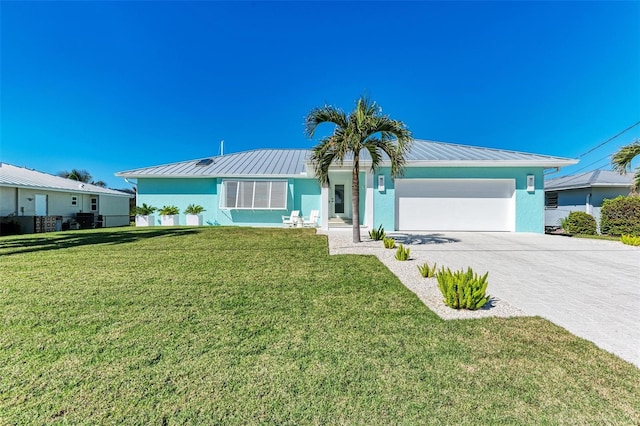 ranch-style home with a front lawn and a garage