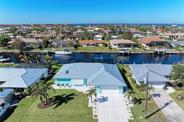 birds eye view of property featuring a water view