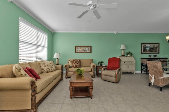 tiled living room featuring ceiling fan and ornamental molding