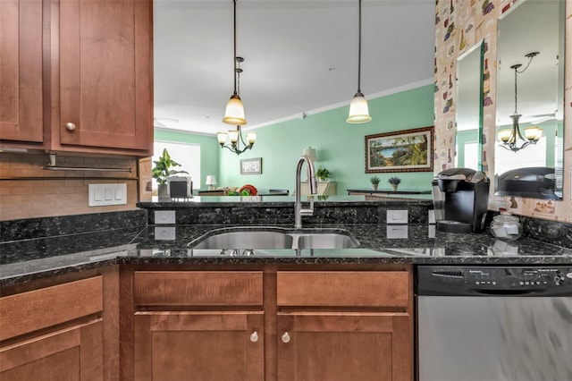 kitchen featuring a chandelier, stainless steel dishwasher, and decorative light fixtures