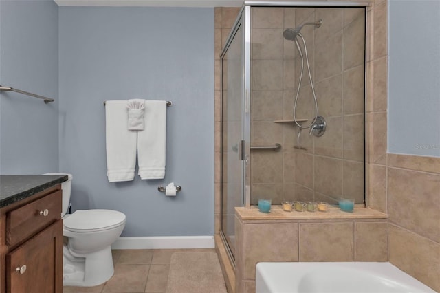 bathroom featuring tile patterned flooring, toilet, and shower with separate bathtub