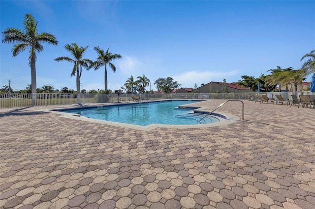 view of pool featuring a patio area