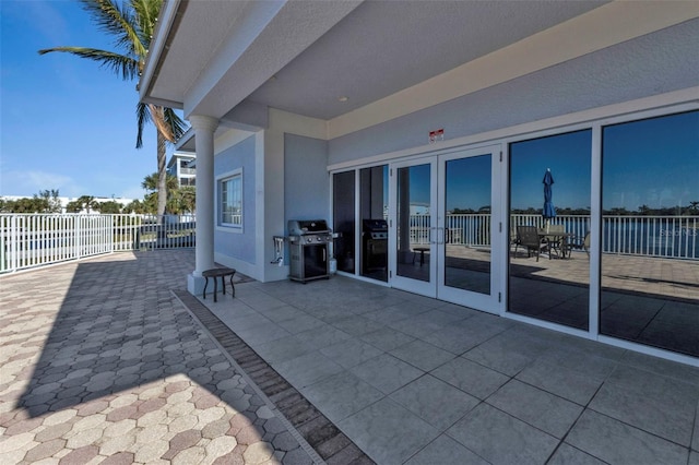 view of patio featuring area for grilling and french doors