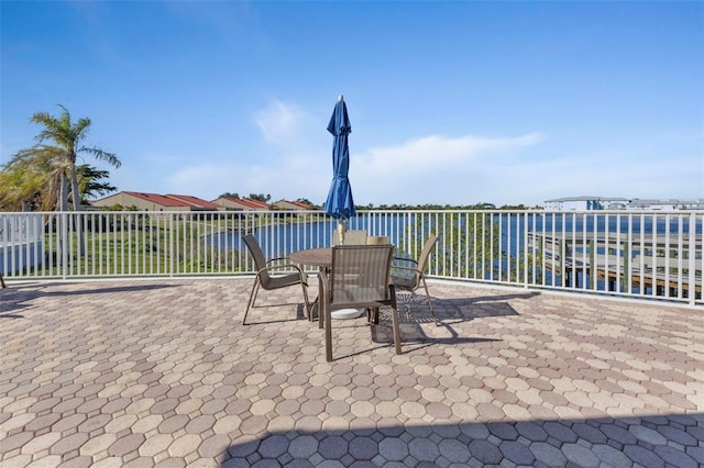 view of patio / terrace featuring a water view