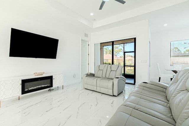 living room featuring ceiling fan