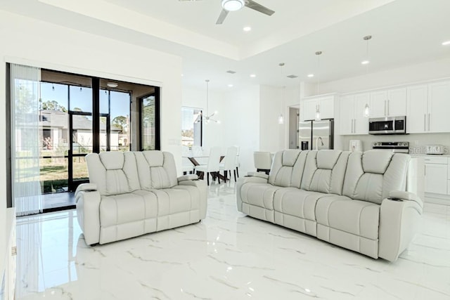 living room featuring ceiling fan