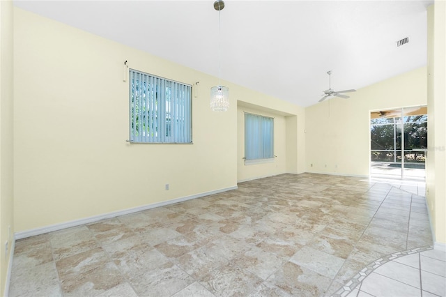 spare room featuring ceiling fan and lofted ceiling