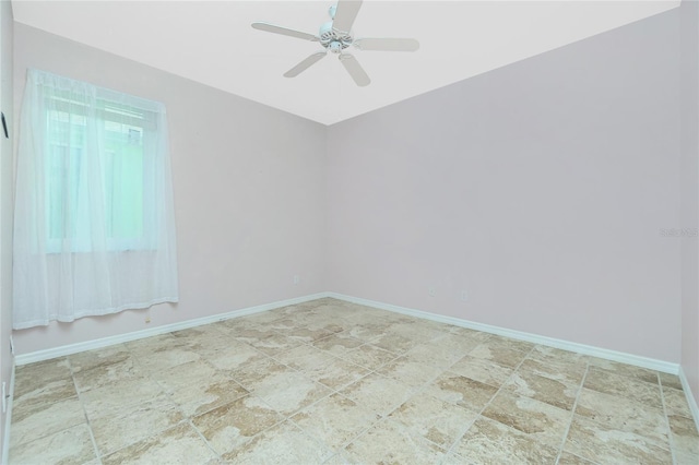 empty room featuring ceiling fan