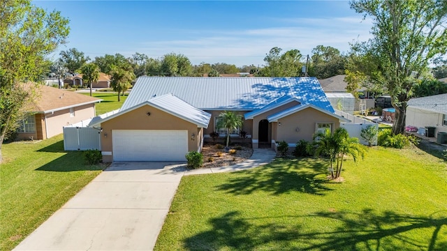 ranch-style home with a front yard and a garage