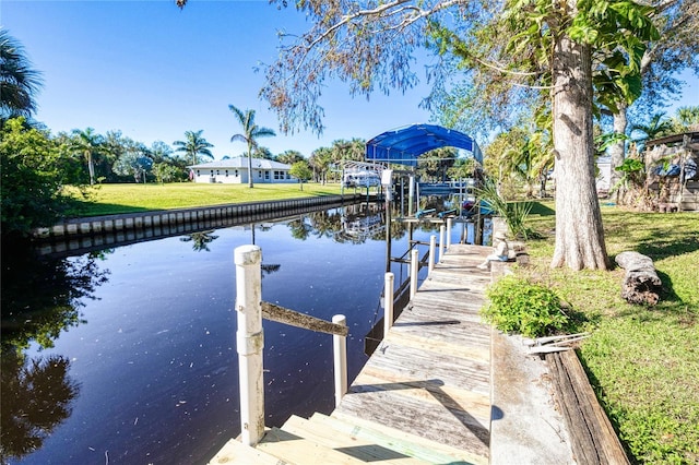 dock area featuring a water view