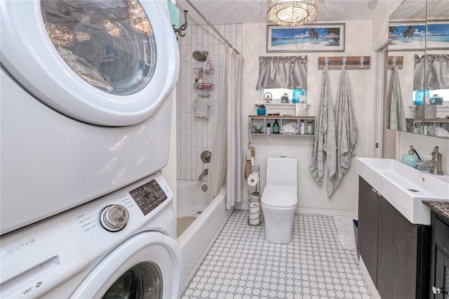 full bathroom with vanity, toilet, stacked washer / drying machine, and shower / tub combo with curtain