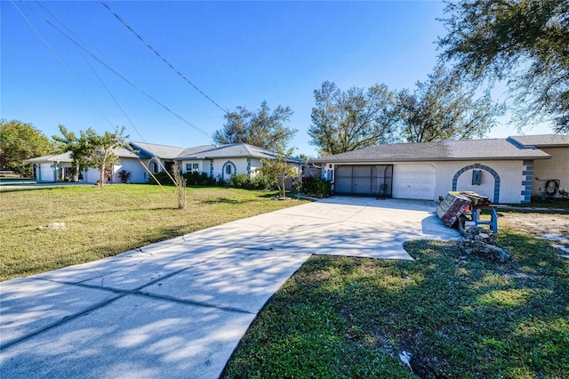 ranch-style home with a front yard and a garage