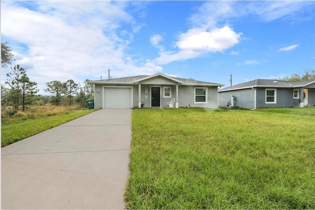 ranch-style home with a garage and a front yard